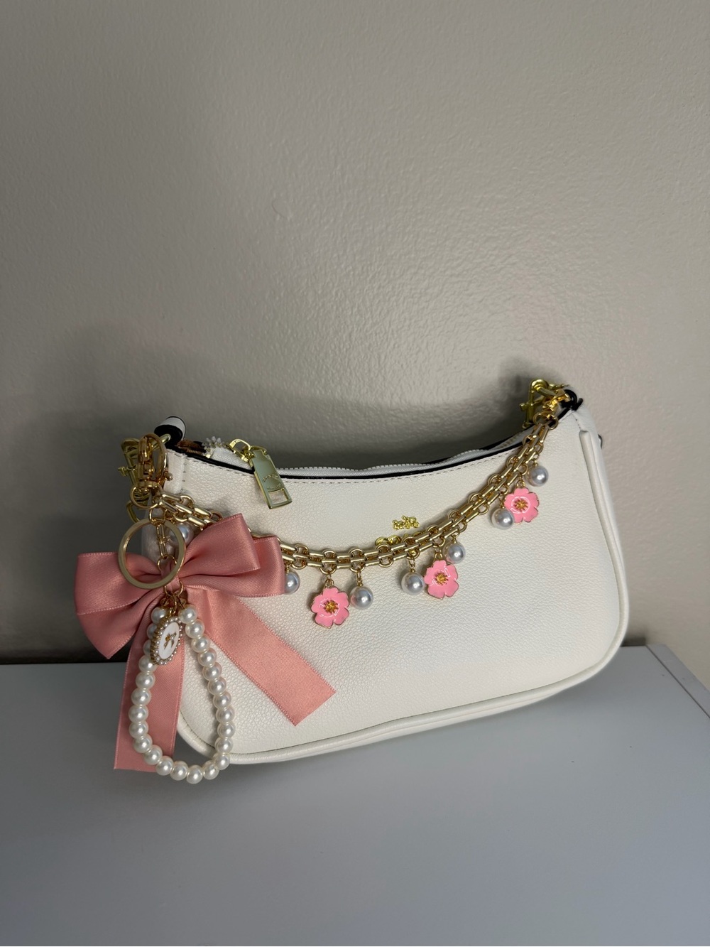 White Women's Shoulder Bag with Pink Floral Charm